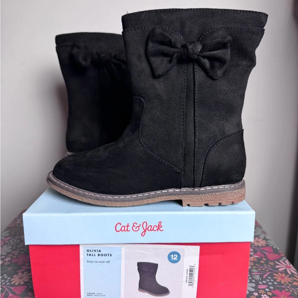 New in box girls black side zip boots with a bow